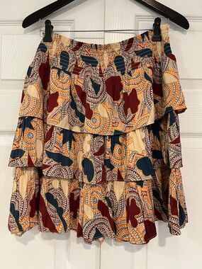Anthropologie tiered ruched short skirt. Size XL. Peach, blue, maroon print.
